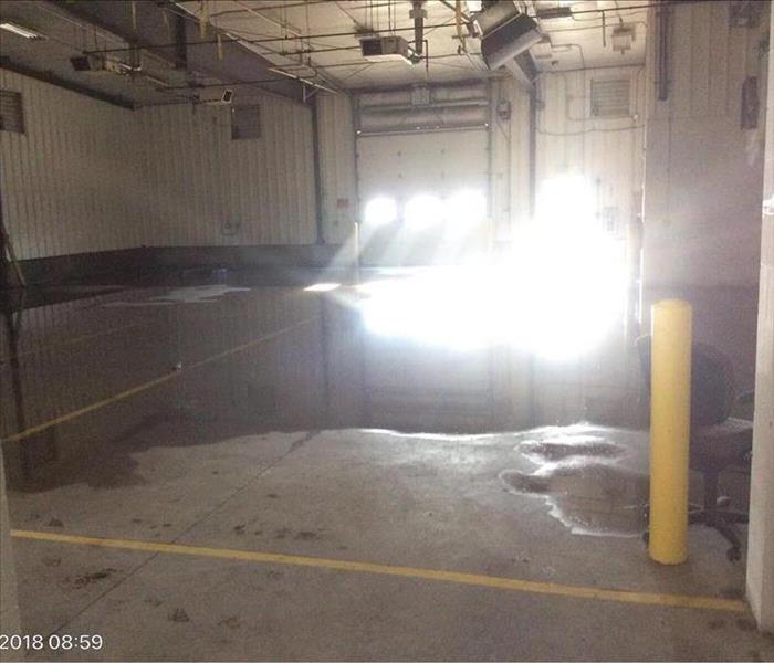 Water on the floor in a commercial garage space