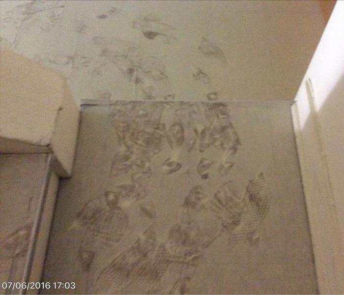 Footprints in white powder on the floor