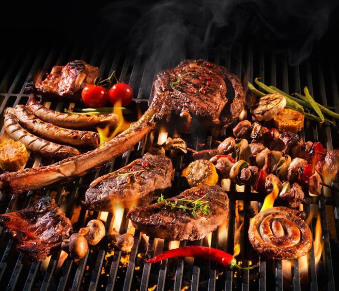 Grilled meat with vegetables, very varied, over charcoal on a barbecue
